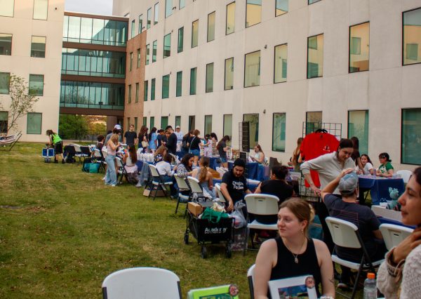 Students browsed handcrafted merchandise at the second annual St. Andre Market, where over 250 attendees gathered to support student entrepreneurs. The event, organized by the St. Andre residence life staff, has become the hall's most popular program.