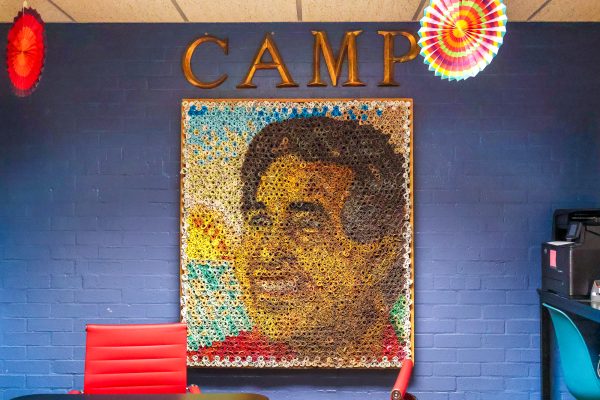A portrait of Caesar Chavez, civil rights activist and co-founder of the United Farm Workers union, hangs in the CAMP office. The portrait is made entirely out of letters that were written by past SEU CAMP students.