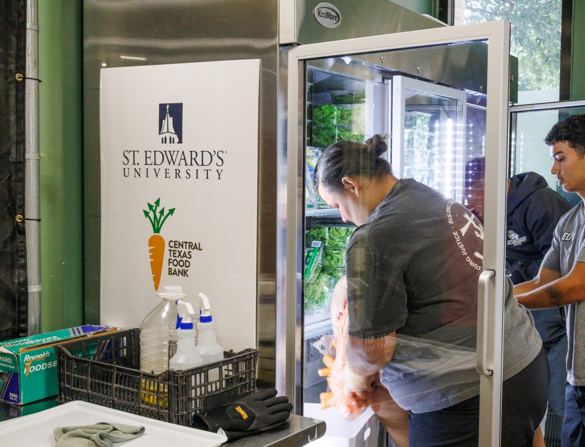The Central Texas Food Bank delivers food to The Huddle every Tuesday morning. Manjarrez, along with volunteers, clean and place produce in the fridges for community members to take throughout the week. 