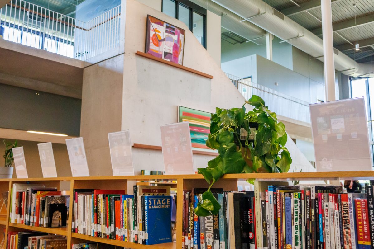 “It’s to get more students into this building, to build relationships with your librarians, to build relationships with each other, to become familiar with and comfortable in this environment...” said Casey Gibbs, the director of Munday Library on the return of physical books.