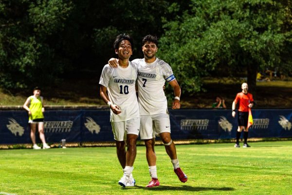 Shunji Watanabe and Arthur Souza embrace after Watanabe’s goal in the second half. Both players are graduate students spending their last few years of eligibility on the hilltop. Souza redshirted his freshman year at the University of Wisconsin Milwaukee, and Shunji spent his sophomore year at SEU, his first in the U.S., on the club soccer team.