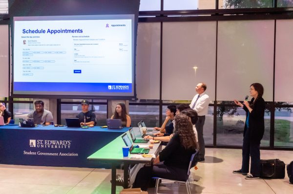 Guest speakers Smith and Foster discuss with the SGA senate the addition of Navigate 360 and the features it offers, as well as questions and concerns from the senate and audience. 