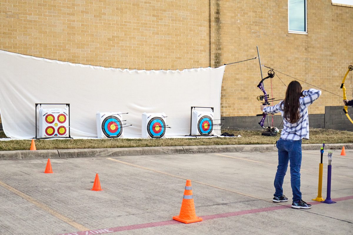 Soltis took aim while she got a round. She had spent most of her time before this aiding members. The members took aim shortly after the officers yelled “hot!”. One of the many code words they used to lead the practice session. “Hot” meant participating players were free to shoot at the targets and others had to stay behind by a certain distance, which was indicated by rope.