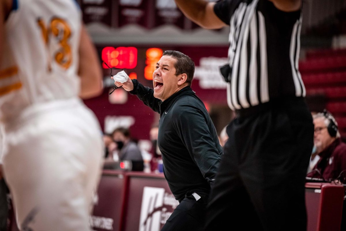 Head coach Andre Cook circa March 2021, coaching the Hilltoppers to a second round win in the Lone Star Conference tournament against the Texas A&M University–Kingsville Javelinas in Canyon, Texas.
